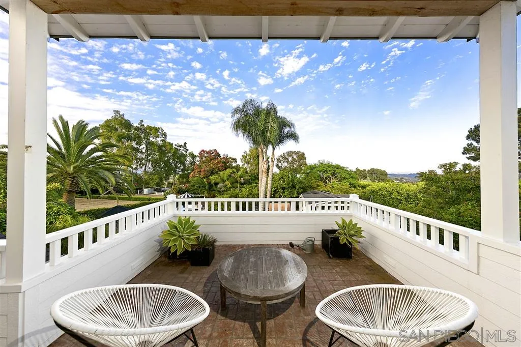 1441 Crest Drive Encinitas, CA 92024 - Photo 23 of 25 a balcony with table and chairs