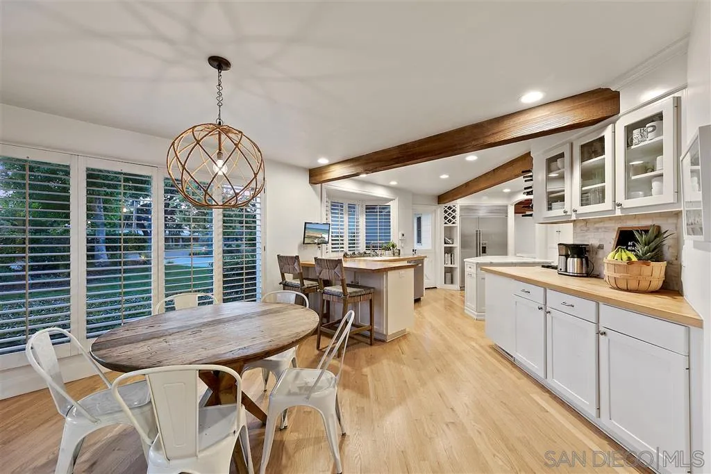 1441 Crest Drive Encinitas, CA 92024 - Photo 7 of 25 a very nice looking dining room with a table and chairs
