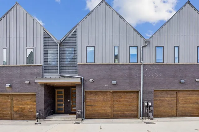 a front view of a building with a glass door