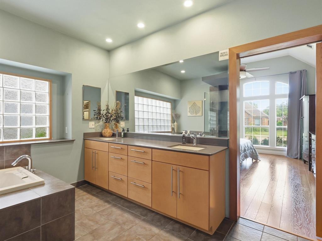 851 Chalfont Place Coppell, TX 75019 - Photo 15 of 36 a kitchen with sink stove and refrigerator