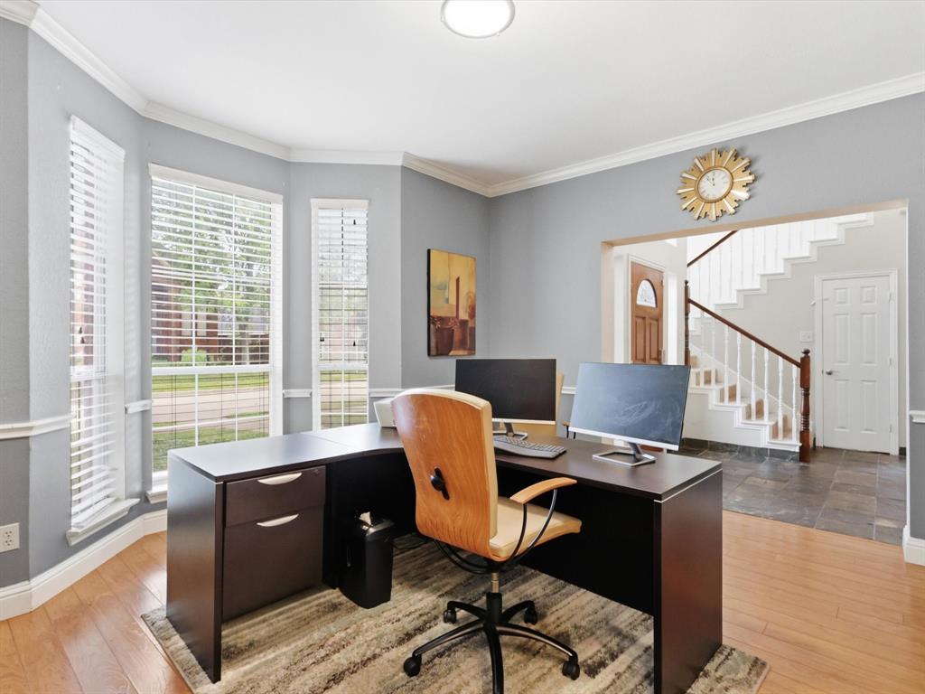 851 Chalfont Place Coppell, TX 75019 - Photo 18 of 36 a view of a workspace with furniture and a window