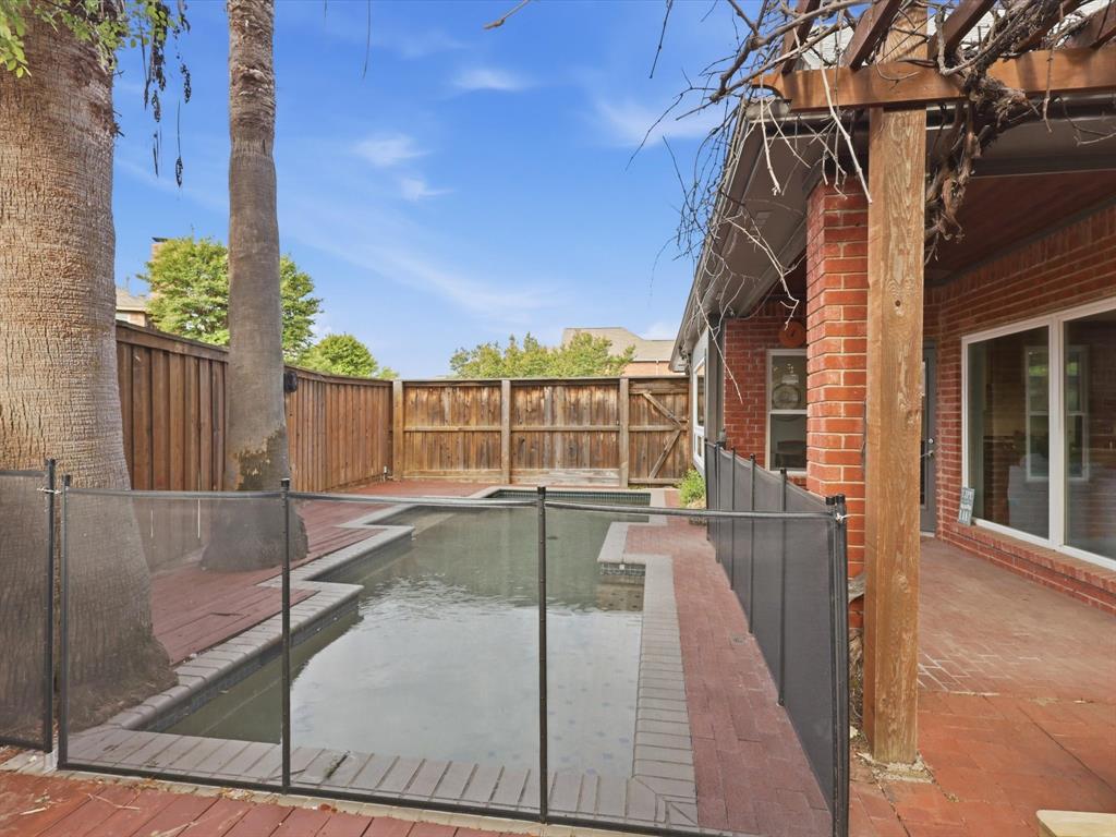851 Chalfont Place Coppell, TX 75019 - Photo 28 of 36 a view of a house with backyard