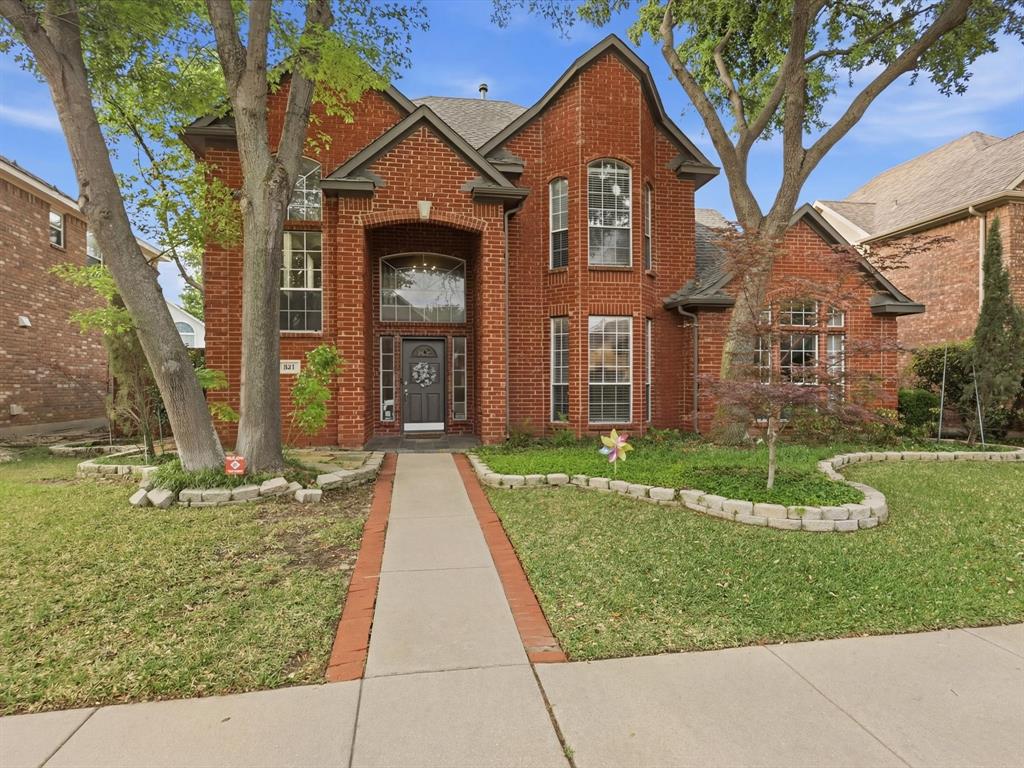 851 Chalfont Place Coppell, TX 75019 - Photo 36 of 36 front view of a house with a yard