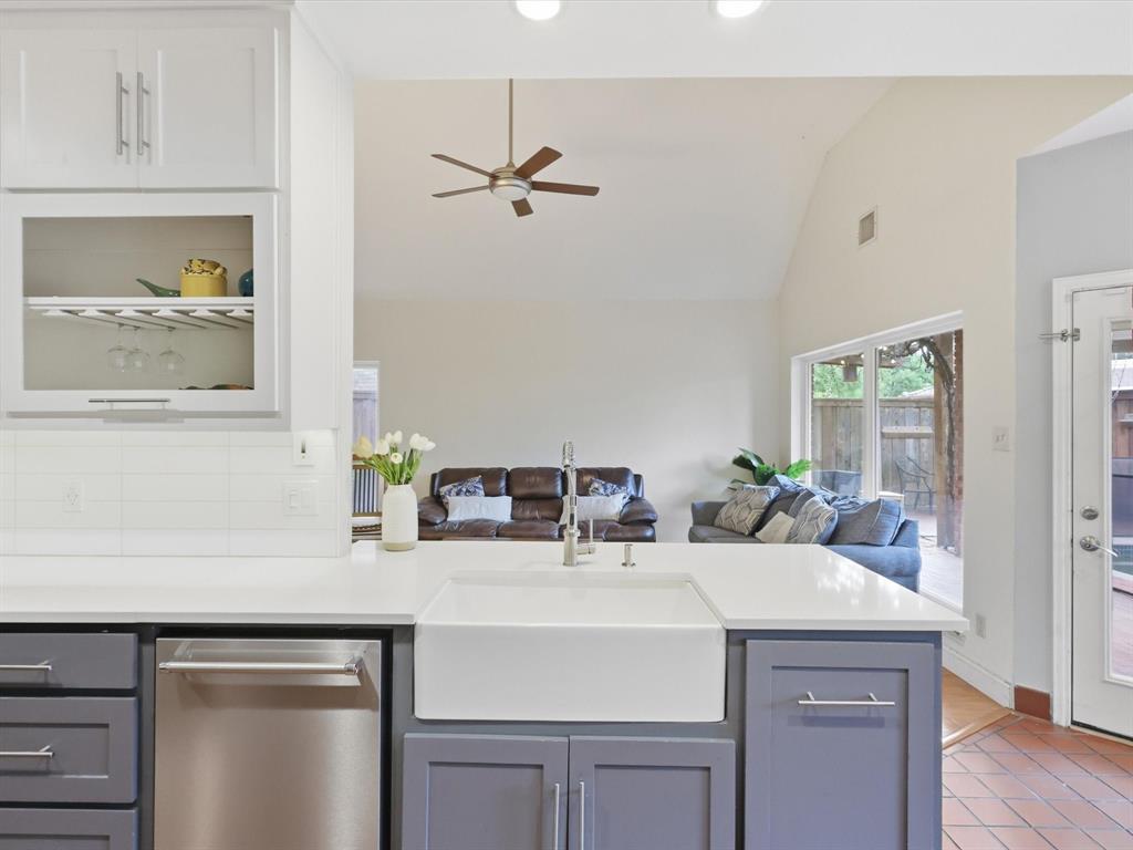851 Chalfont Place Coppell, TX 75019 - Photo 5 of 36 a kitchen with a sink and cabinets