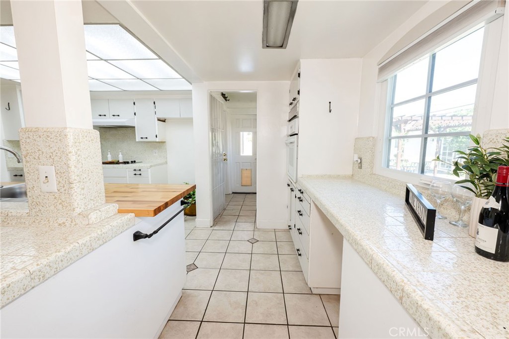929 3rd Street Orland, CA 95963 - Photo 16 of 61 Kitchen entry, some cabinets have pull out shelves