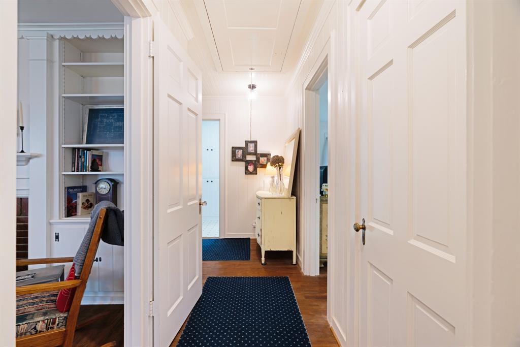 2257 Cleveland Street Paris, TX 75460 - Photo 10 of 28 a view of a hallway with wooden floor and workspace