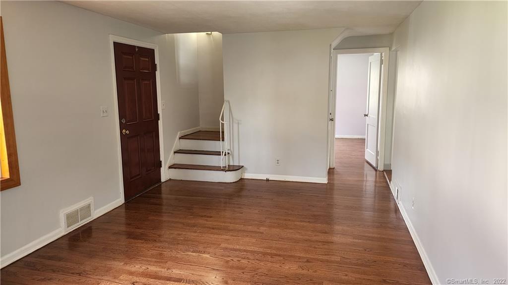 25 Madsen Road West Hartford, CT 06110 - Photo 3 of 16 wooden floor in an empty room with wooden floor