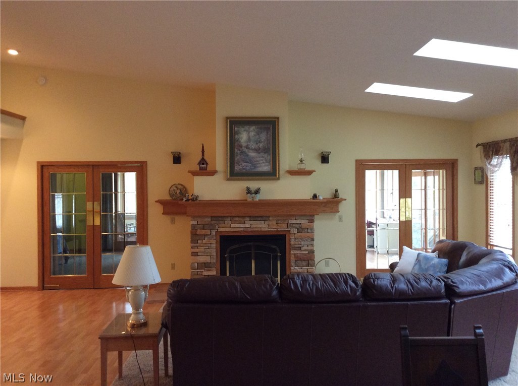 3400 Church Road Medina, OH 44256 - Photo 18 of 24 ADDITIONAL VIEW OF GREAT ROOM WITH 2 SETS OF OVERSIZED FRENCH DOORS-LEADING EITHER TO MASTER SUITE OR OFFICE & SUN ROOM.