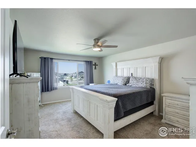 a view of living room with furniture and a flat screen tv
