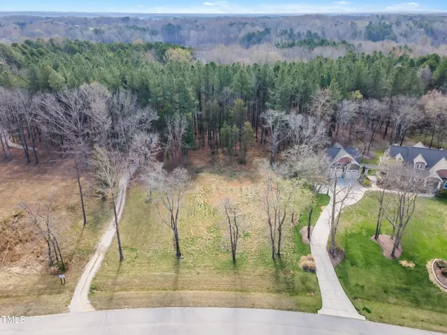 a view of a lake with a yard
