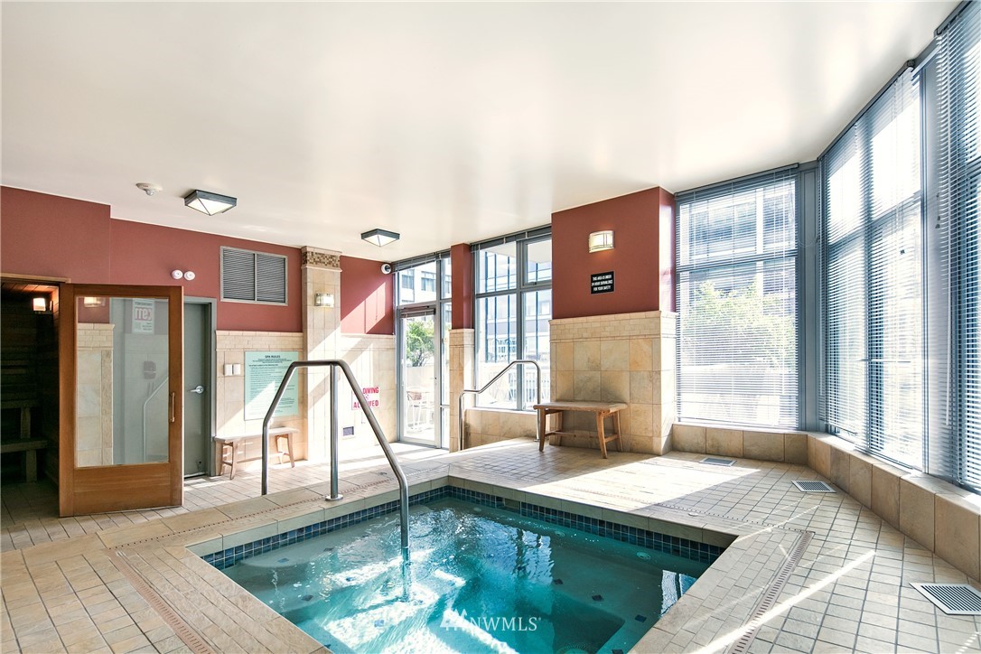 819 Virginia Street, Unit 2804 Seattle, WA 98101 - Photo 17 of 22 a very nice looking room with a large window