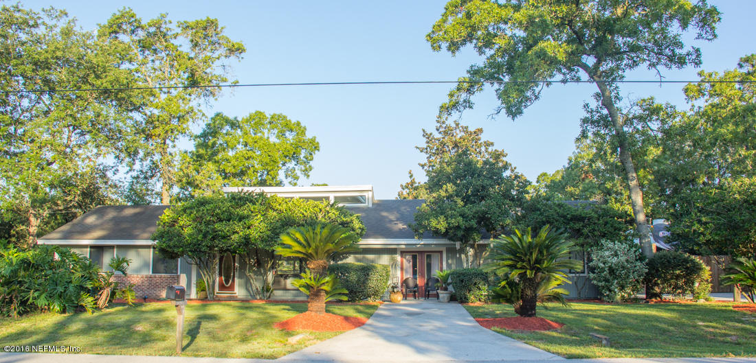 12594 Agatite Road Jacksonville, FL 32258 - Photo 1 of 49 a front view of a house with garden