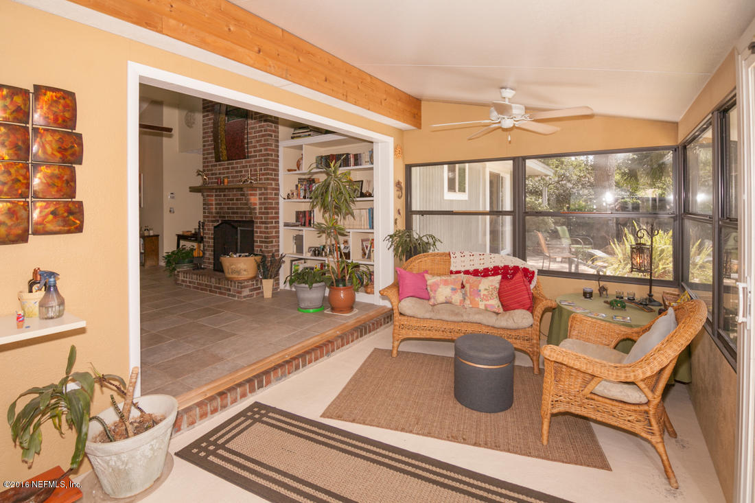 12594 Agatite Road Jacksonville, FL 32258 - Photo 33 of 49 a room with furniture and view of kitchen