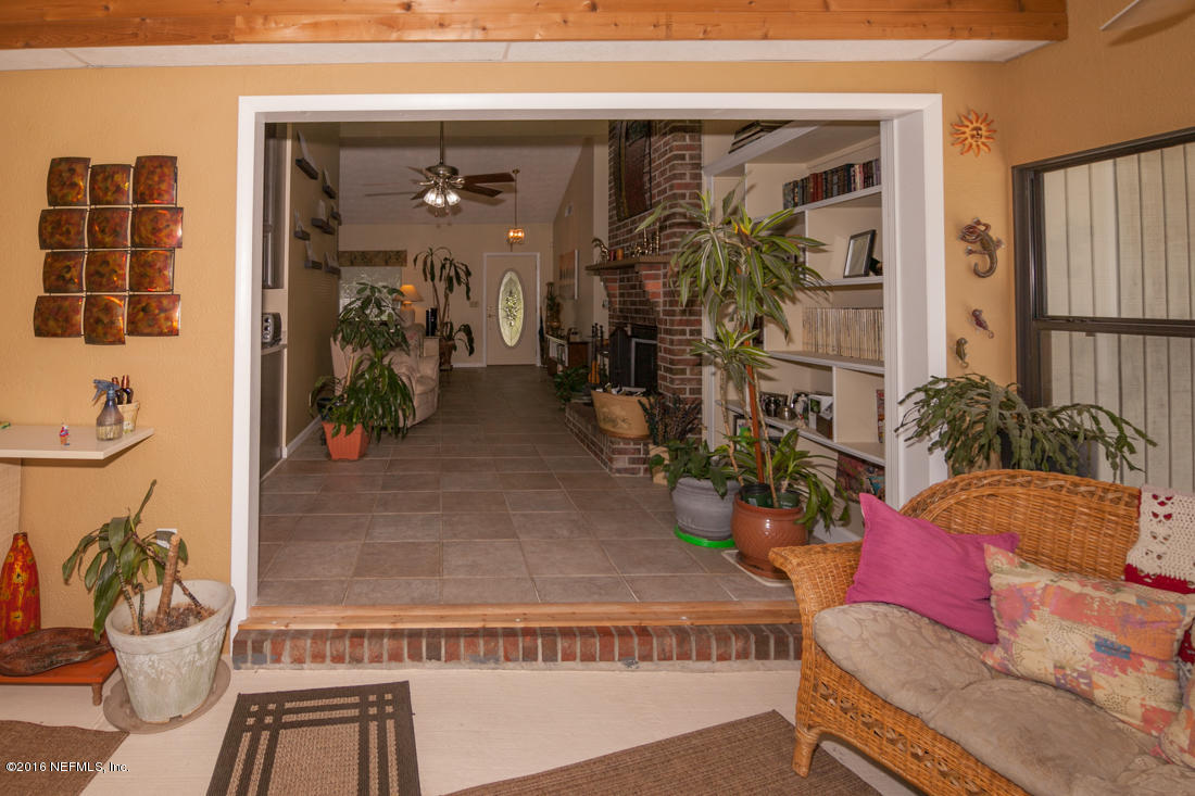 12594 Agatite Road Jacksonville, FL 32258 - Photo 35 of 49 a living room with furniture