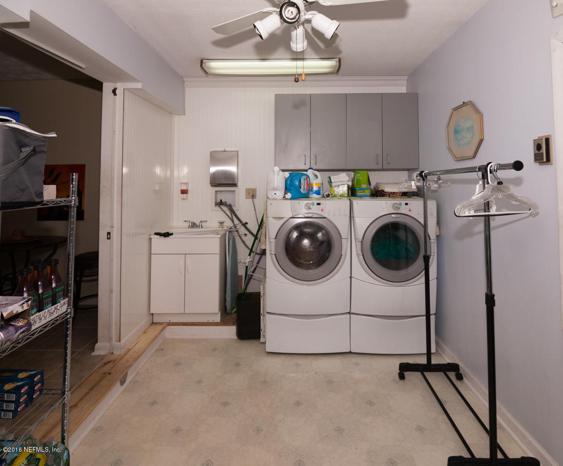 12594 Agatite Road Jacksonville, FL 32258 - Photo 38 of 49 a utility room with dryer and washer