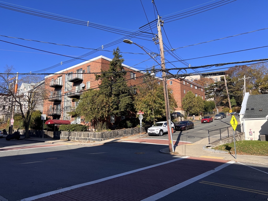 215 Washington Avenue, Unit 9 Chelsea, MA 02150 - Photo 15 of 16 a view of a building with sitting area