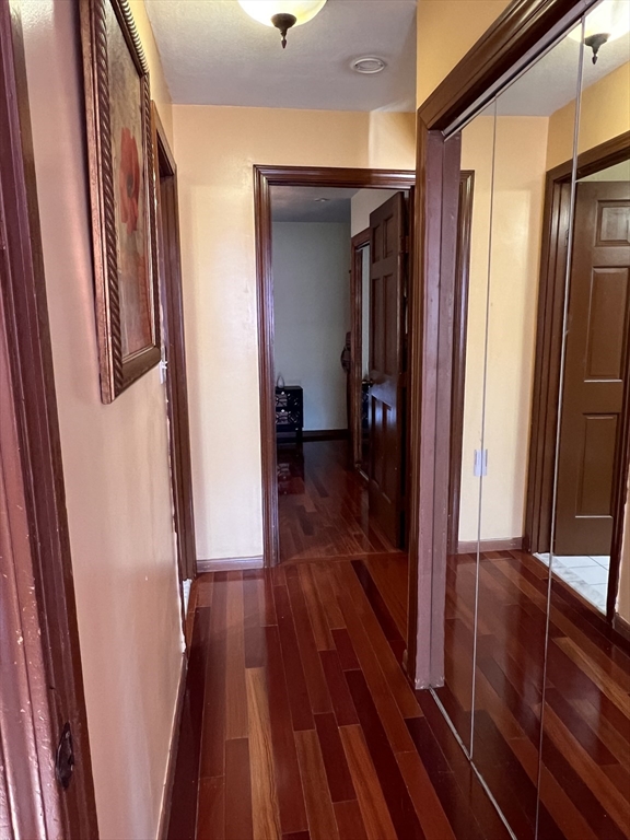 215 Washington Avenue, Unit 9 Chelsea, MA 02150 - Photo 10 of 16 a view of hallway with wooden floor
