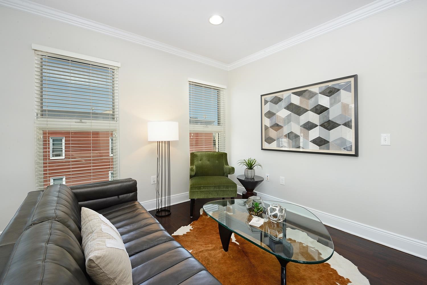 619 Adams Street, Unit 509 Hoboken, NJ 07030 - Photo 10 of 29 a living room with furniture and wooden floor