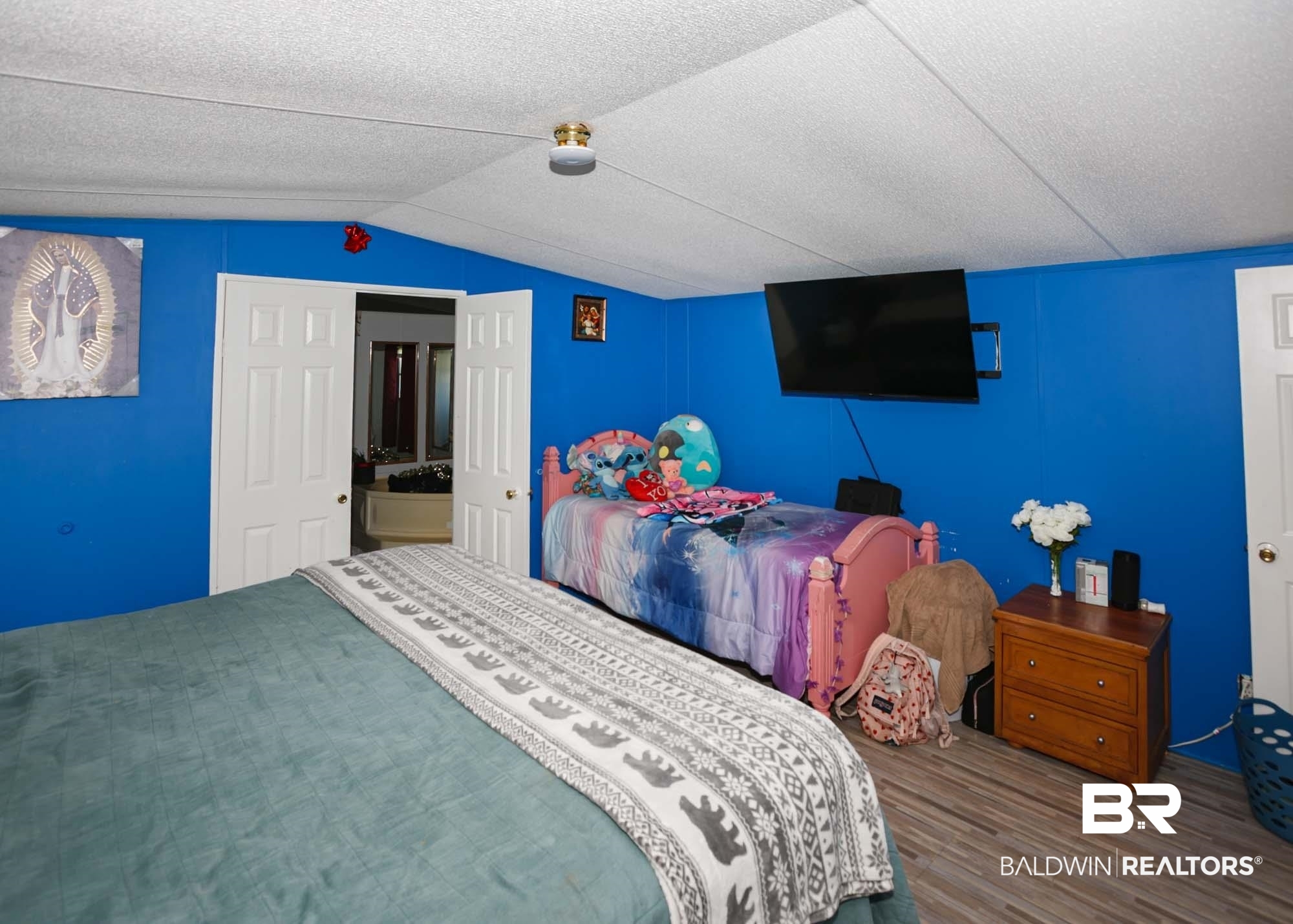 14005 County Road 49 Foley, AL 36535 - Photo 17 of 38 Bedroom with wood finished floors and lofted ceiling