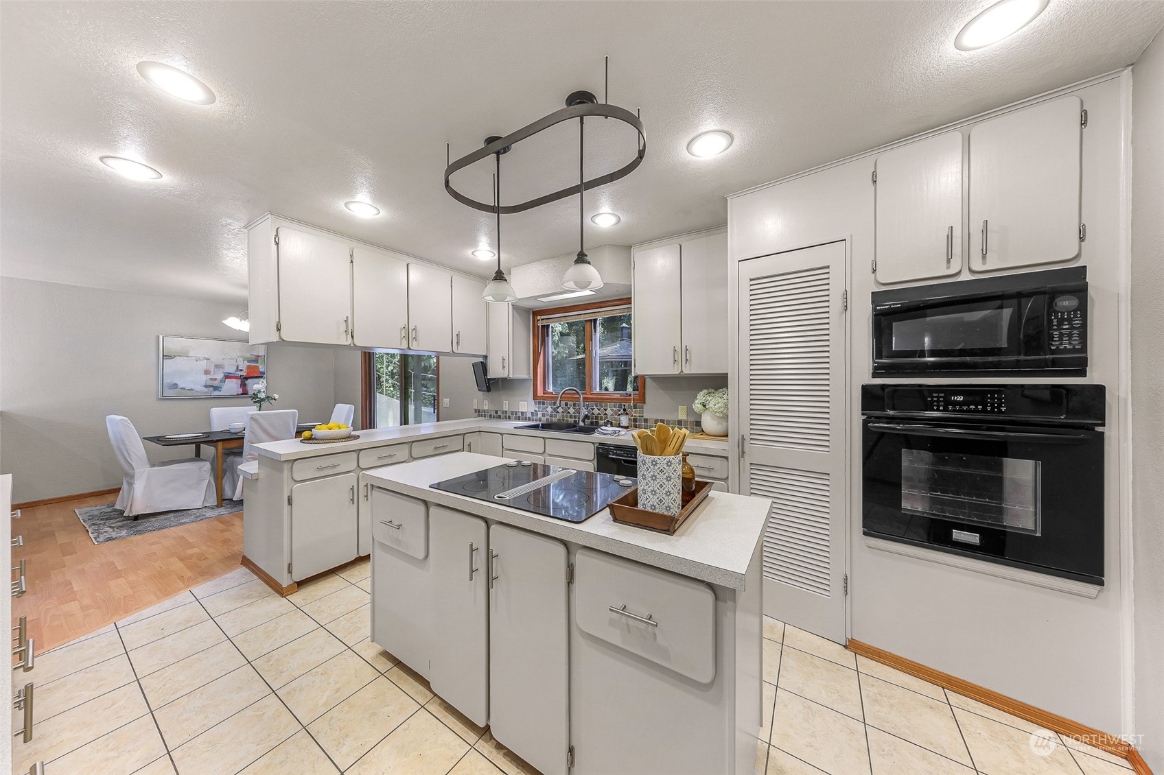 3901 Cabrant Road Everson, WA 98247 - Photo 9 of 40 a kitchen that has a lot of cabinets in it and appliances