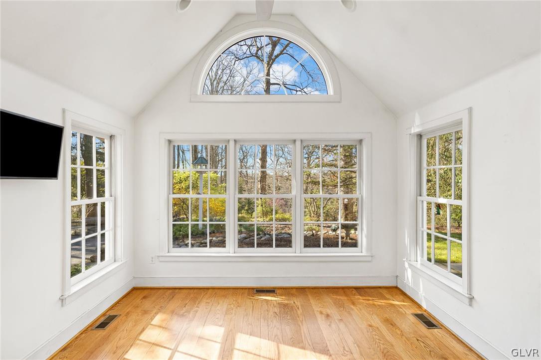175 Beaumont Road Devon, PA 19333 - Photo 11 of 49 a view of an empty room with a window and a flat screen tv