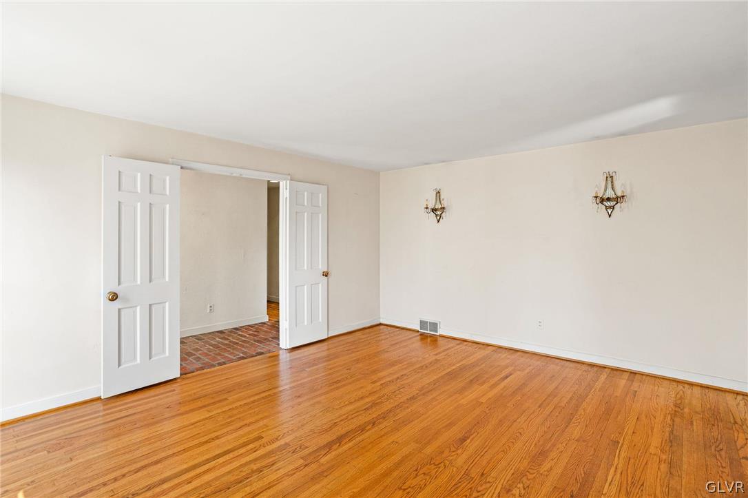 175 Beaumont Road Devon, PA 19333 - Photo 22 of 49 a view of an empty room with wooden floor