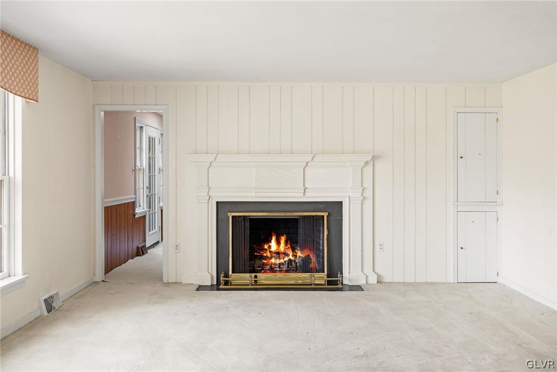175 Beaumont Road Devon, PA 19333 - Photo 23 of 49 a living room with a fireplace