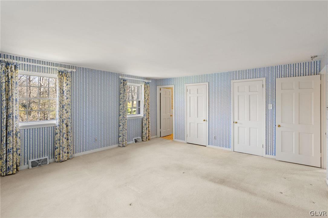 175 Beaumont Road Devon, PA 19333 - Photo 31 of 49 an empty room with windows