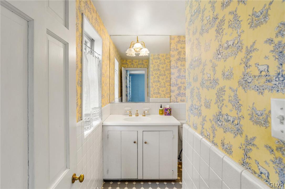 175 Beaumont Road Devon, PA 19333 - Photo 32 of 49 a bathroom with a sink and a mirror