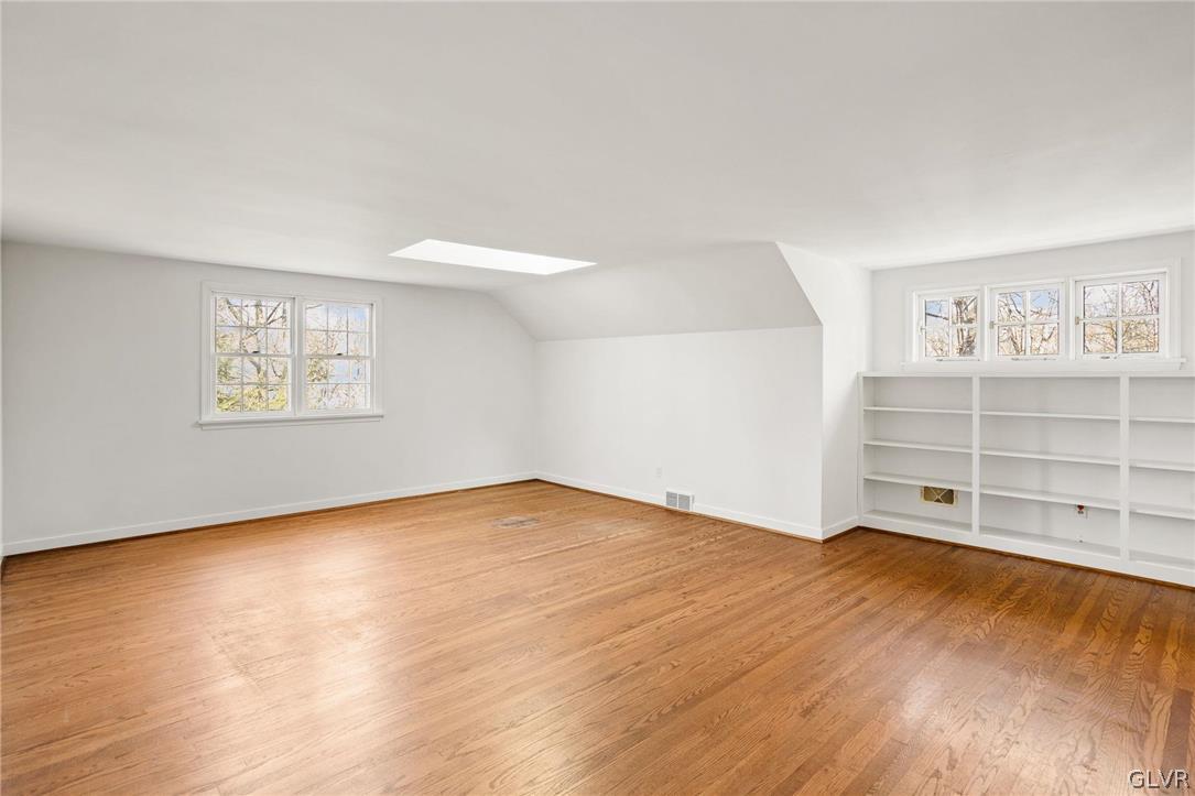175 Beaumont Road Devon, PA 19333 - Photo 40 of 49 wooden floor in an empty room with a window