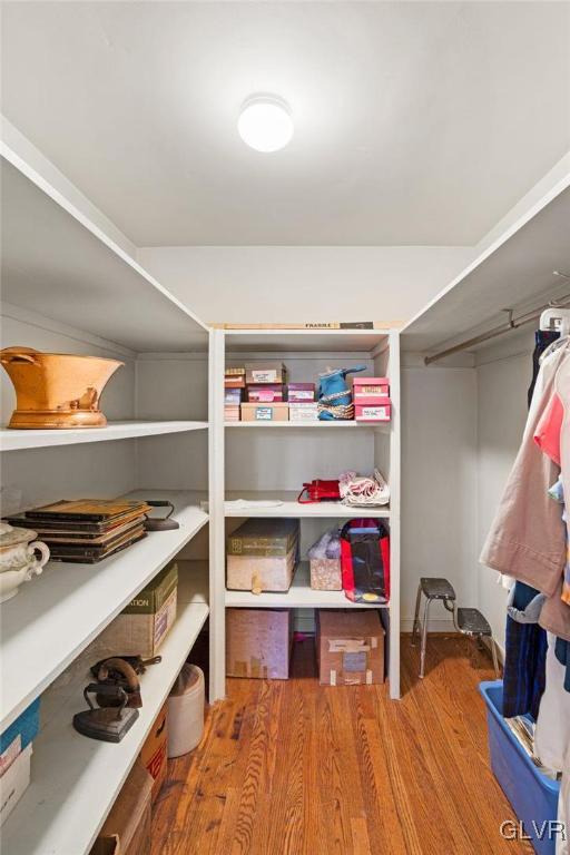 175 Beaumont Road Devon, PA 19333 - Photo 42 of 49 a bedroom with a bed and a wooden floor