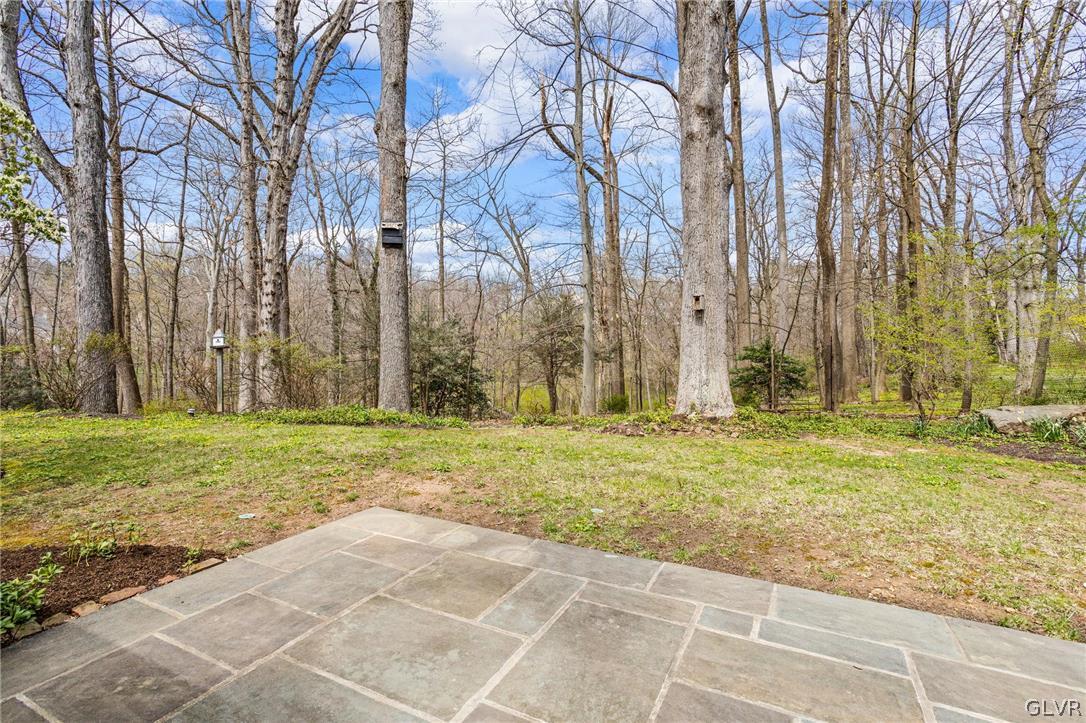 175 Beaumont Road Devon, PA 19333 - Photo 48 of 49 a backyard of apartments with large trees