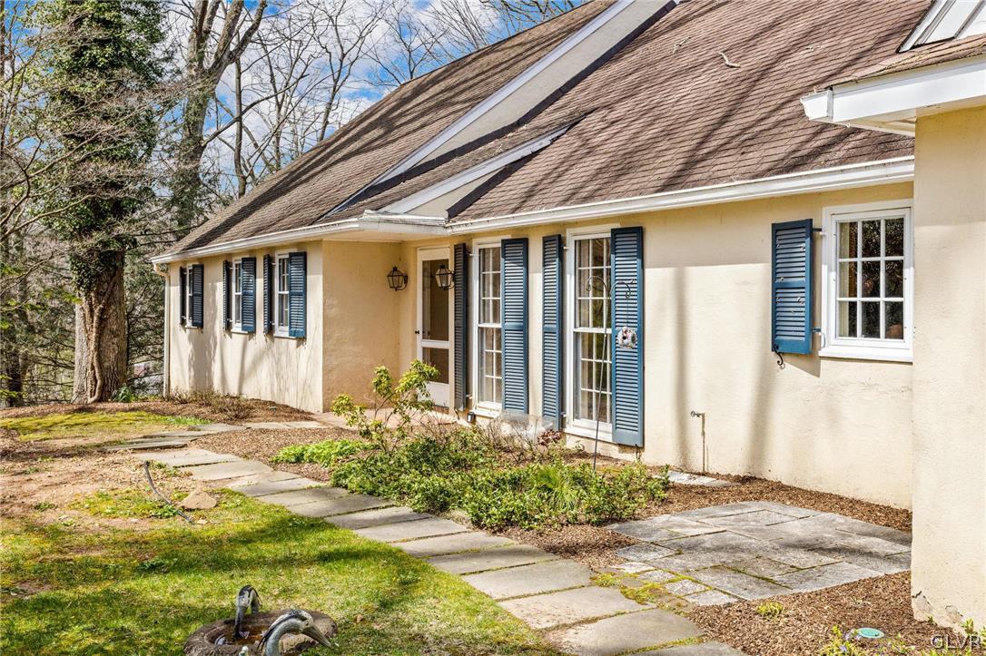 175 Beaumont Road Devon, PA 19333 - Photo 6 of 49 a front view of a house with a yard