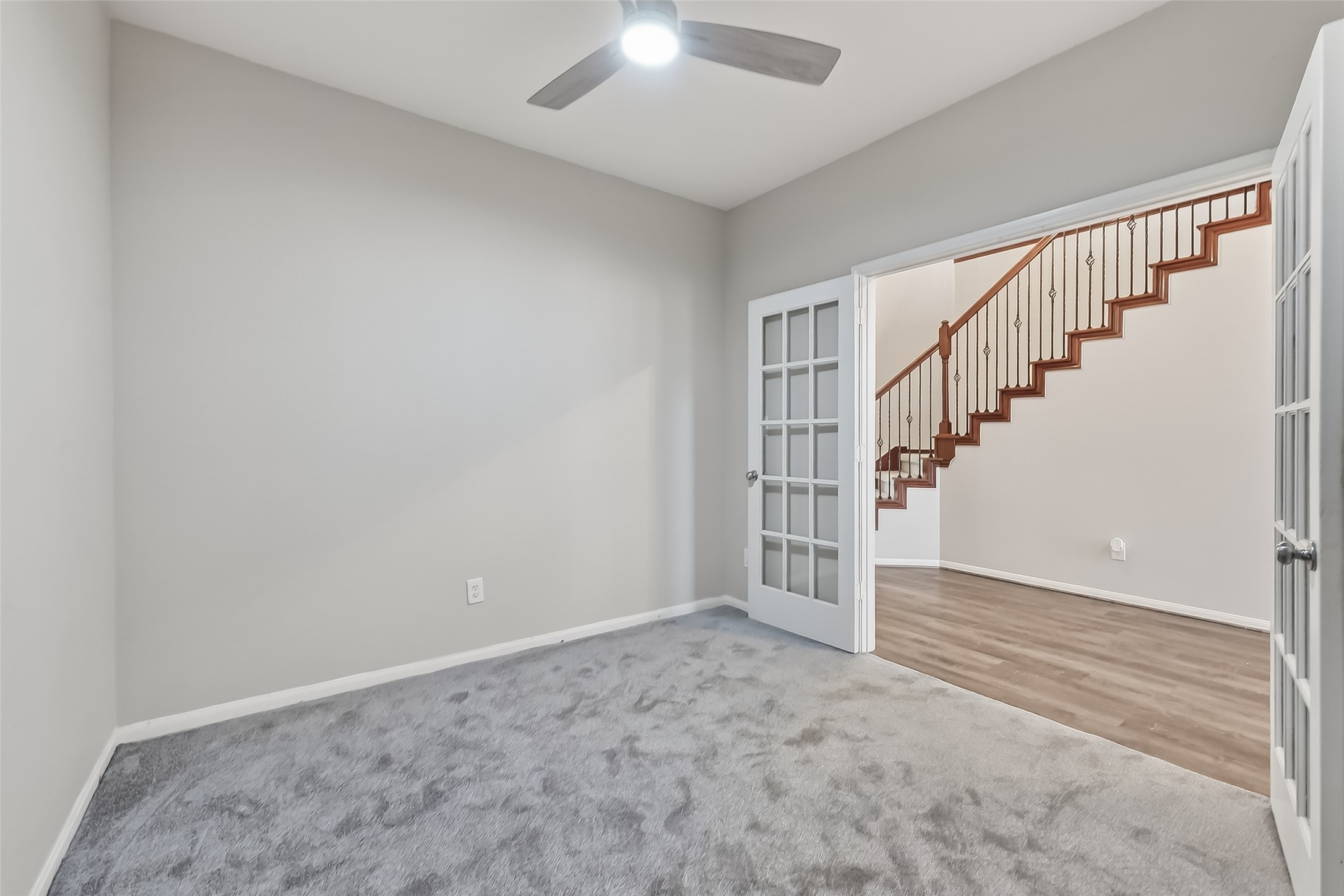 9151 Monarch Field Lane Cypress, TX 77433 - Photo 14 of 48 a view of an empty room with stairs