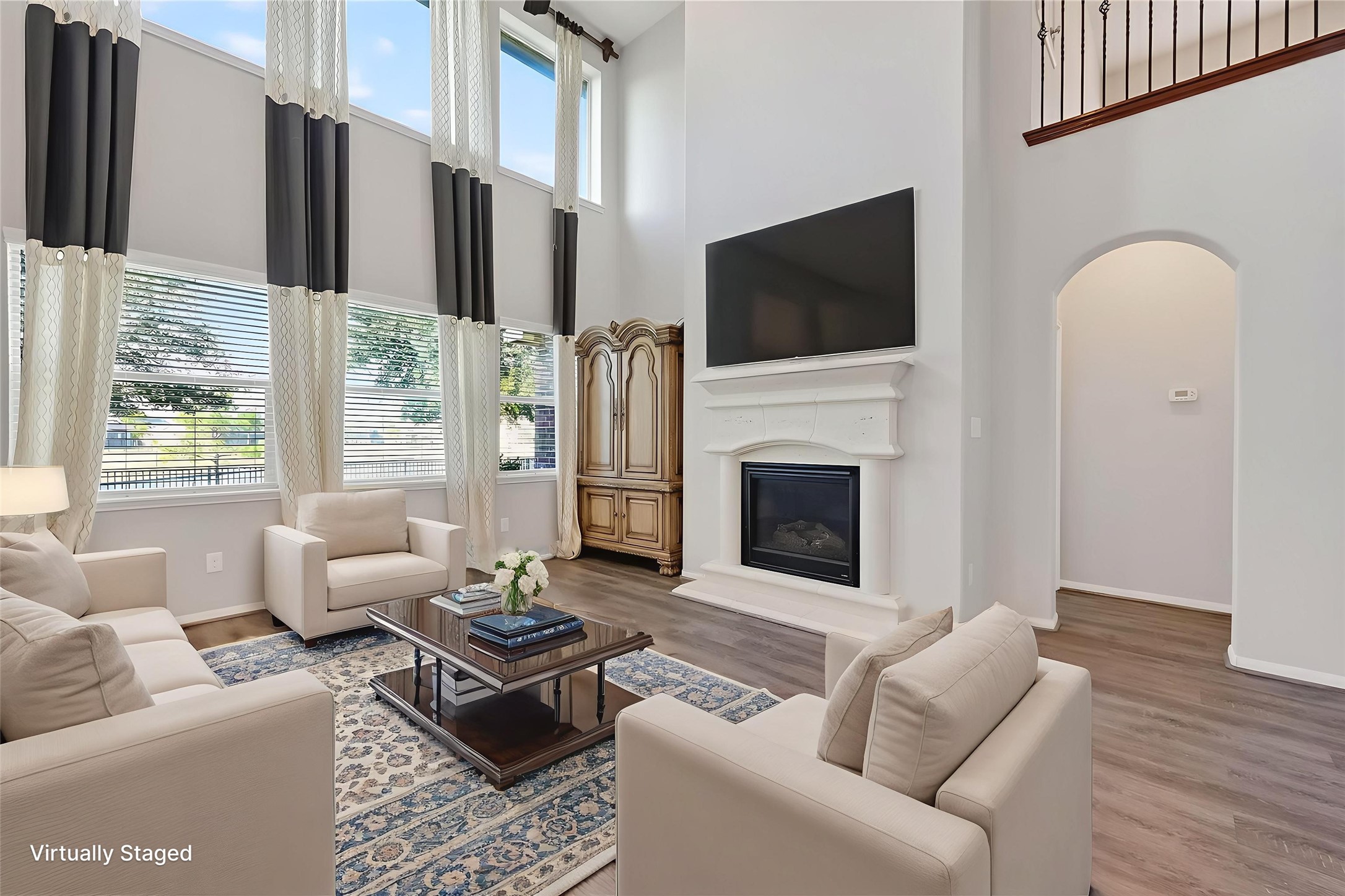 9151 Monarch Field Lane Cypress, TX 77433 - Photo 21 of 48 a living room with furniture fireplace and flat screen tv