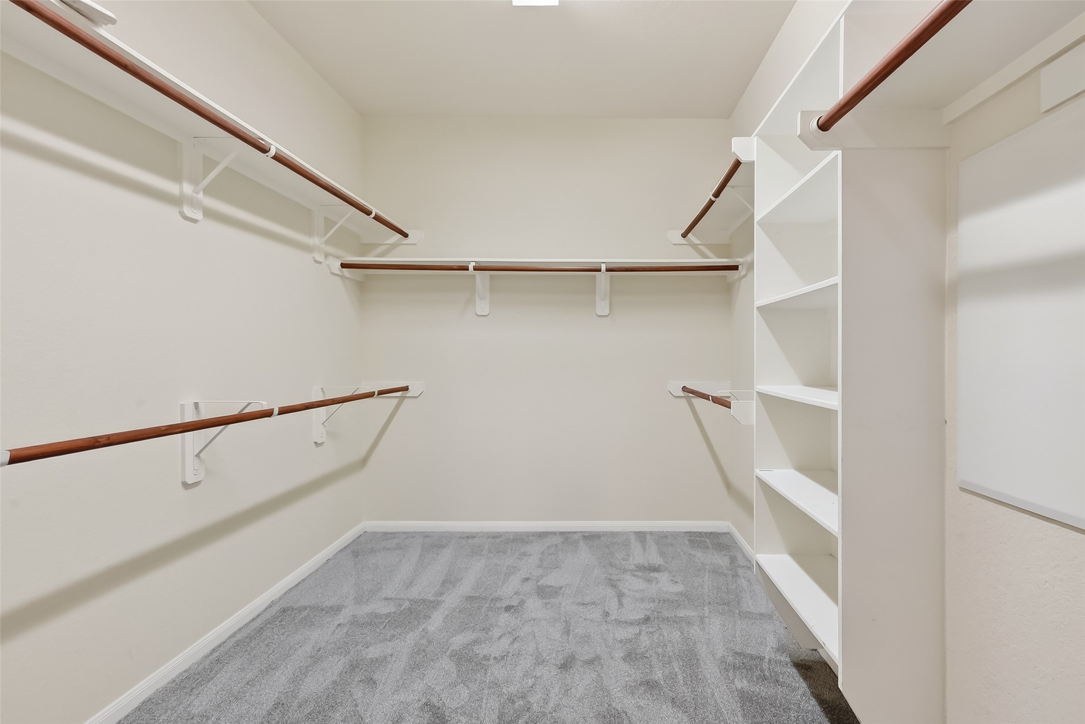 9151 Monarch Field Lane Cypress, TX 77433 - Photo 28 of 48 a view of walk in closet