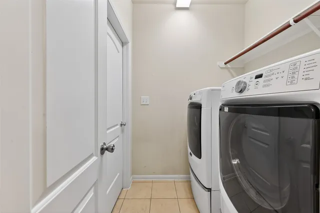 a utility room with washer and dryer