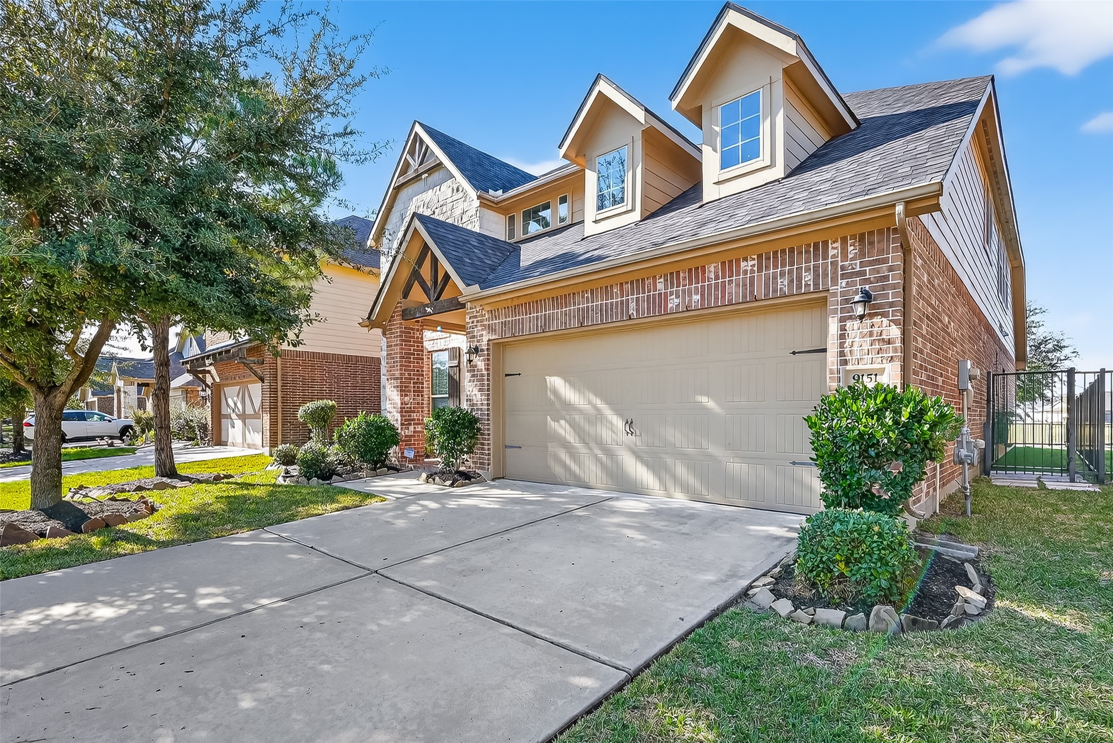 9151 Monarch Field Lane Cypress, TX 77433 - Photo 6 of 48 a front view of a house with garden