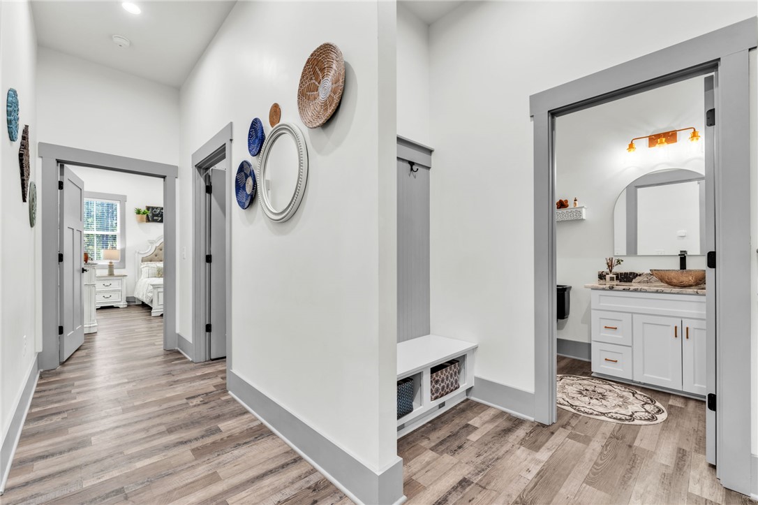 919 Watercrest Road West Union, SC 29696 - Photo 22 of 50 This spacious hallway offers a smooth transition to multiple well-appointed rooms.