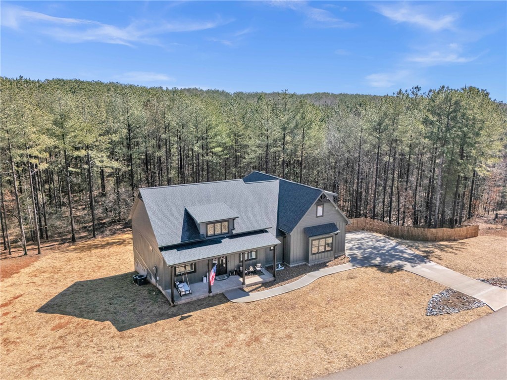 919 Watercrest Road West Union, SC 29696 - Photo 37 of 50 This captivating home nestles within a serene wooded landscape, offering tranquil living.