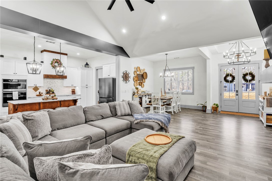 919 Watercrest Road West Union, SC 29696 - Photo 4 of 50 This expansive open concept living space features high ceilings and seamless flow between gathering areas.