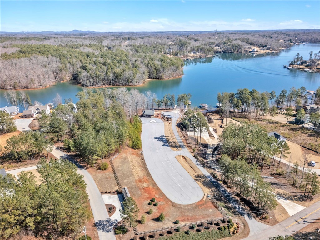 919 Watercrest Road West Union, SC 29696 - Photo 47 of 50 This aerial view showcases a picturesque lakefront community nestled among lush woodlands.