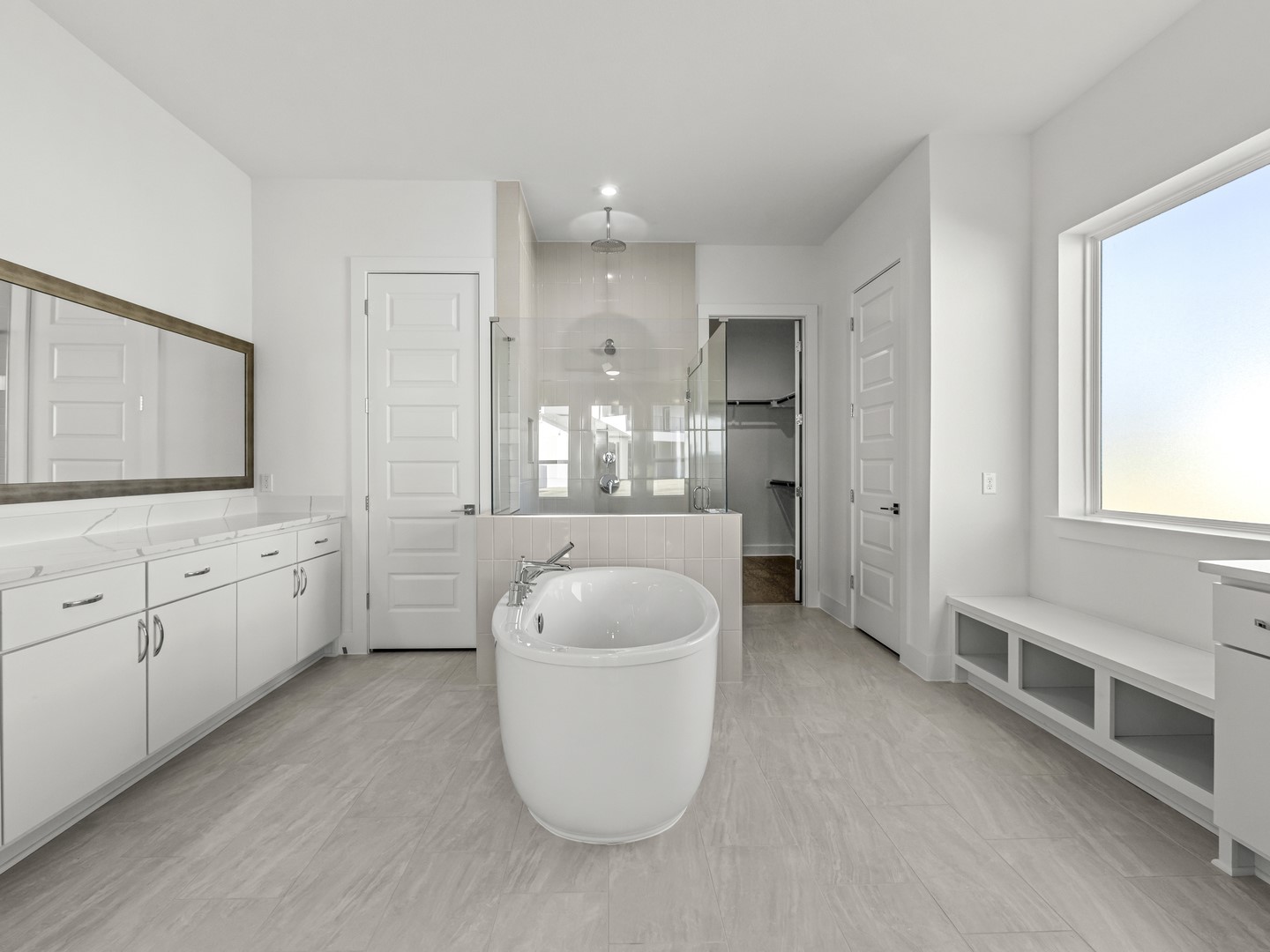 2508 Chiavari Way Leander, TX 78641 - Photo 20 of 24 Luxurious bathing sanctuary with a freestanding tub and a spacious walk-in shower.