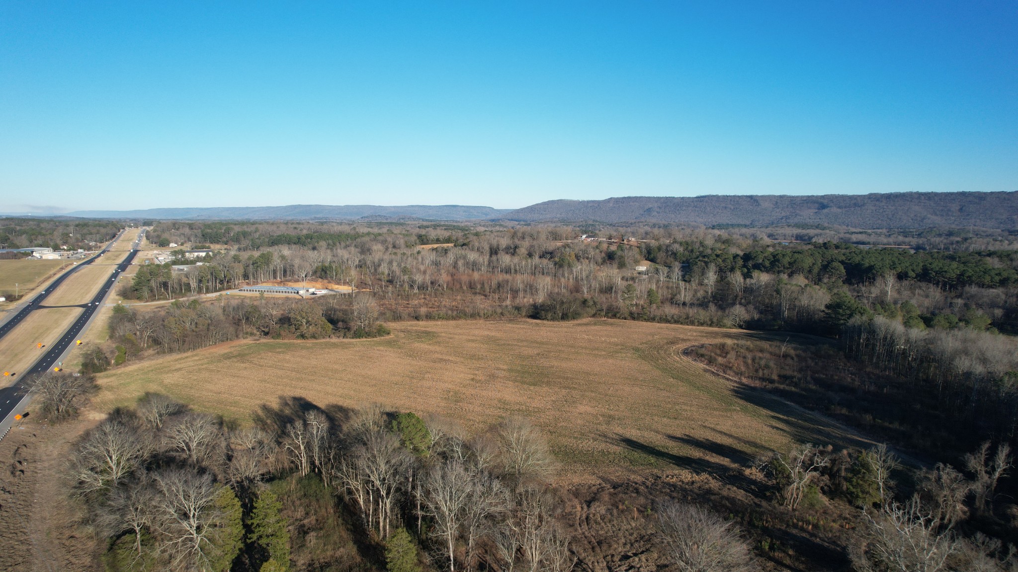 0 Us 72 Hollywood, AL 35752 - Photo 4 of 9 a view of a dry yard with wooden floor and mountain view