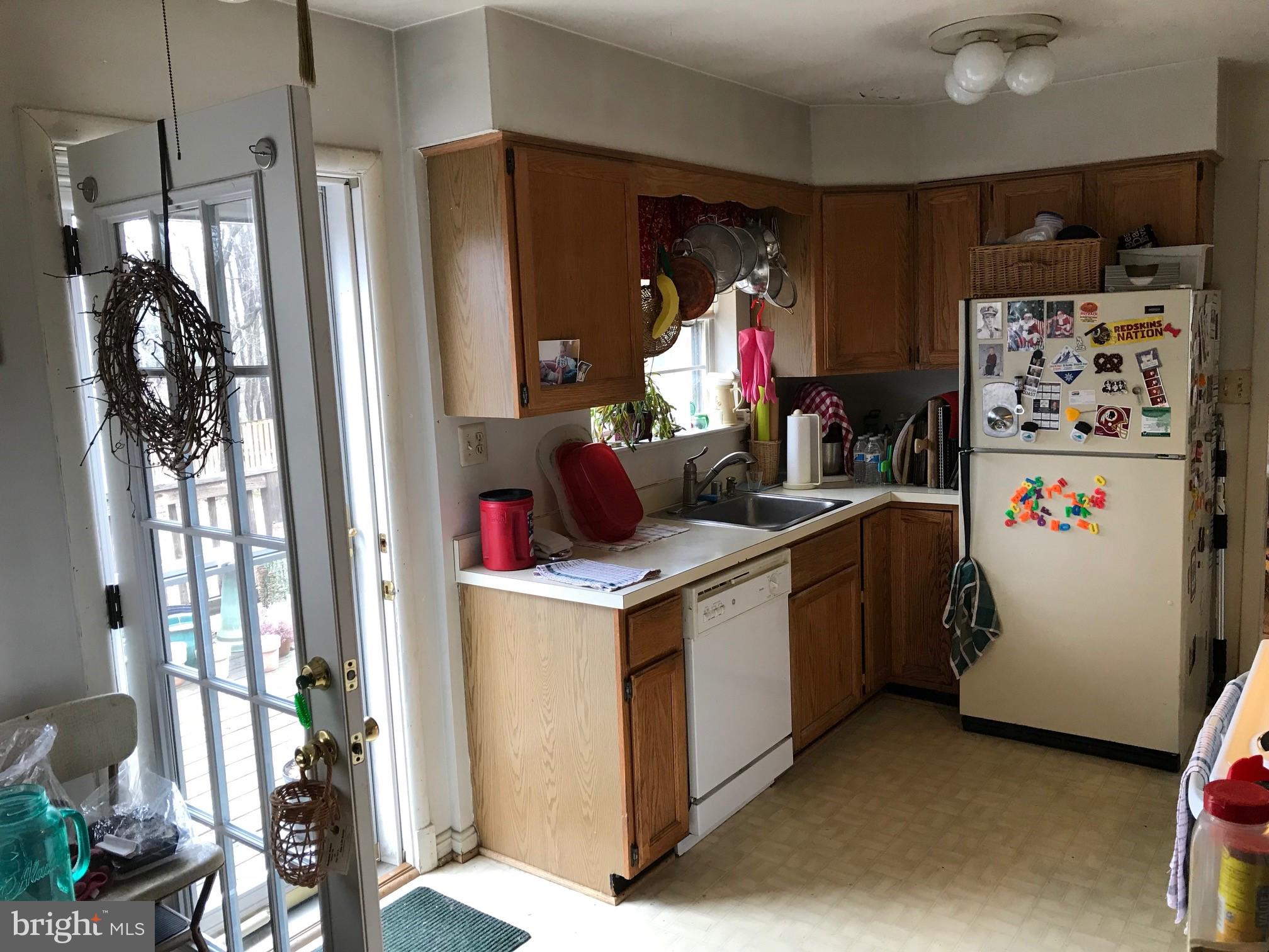 14615 Homecrest Road Silver Spring, MD 20906 - Photo 8 of 24 Kitchen With Door To Deck.