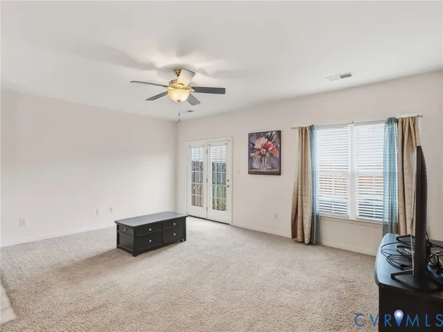 a bathroom with a sink a mirror and a vanity