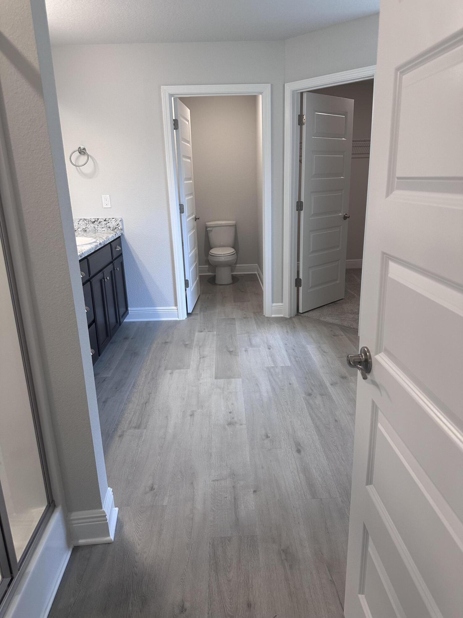 6115 Buckshot Drive Crestview, FL 32539 - Photo 20 of 29 wooden floor in an empty room