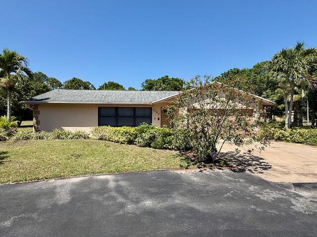 7107 181st Street Jupiter, FL 33458 - Photo 2 of 8 IMG_5330