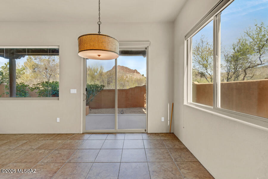 5660 Triangle X Place Tucson, AZ 85713 - Photo 24 of 48 5660 Triangle X Dining to Rear