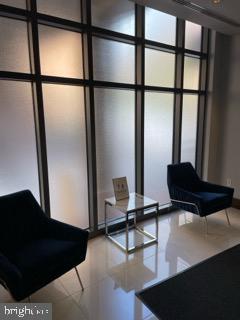 440 L Street Northwest, Unit 1112 Washington, DC 20001 - Photo 8 of 20 a view of a room with gym equipment